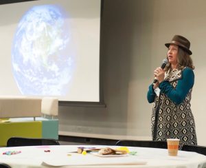 Seleyn DeYarus, co-founder of At the Epicenter, facilitating a sold out Regenerative Earth Summit: Food + Climate + Culture.